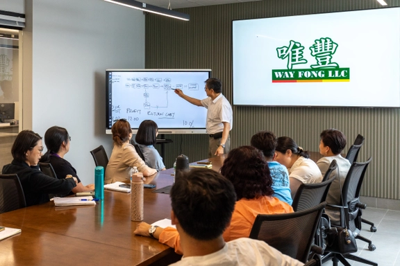 Wally Poon giving a presentation to the Way Fong sales team