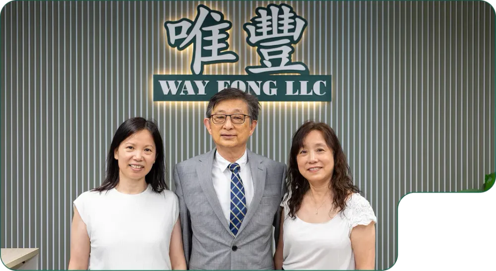 Wally Poon and team under the Wayfong Sign