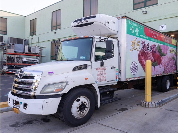 Wayfong trucks at the warehouse